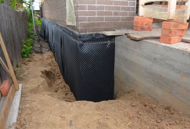 Happy homeowners after waterproofing job in Roseland